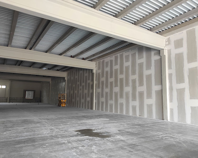 Obra nave industrial, cerramientos de protección frente al fuego